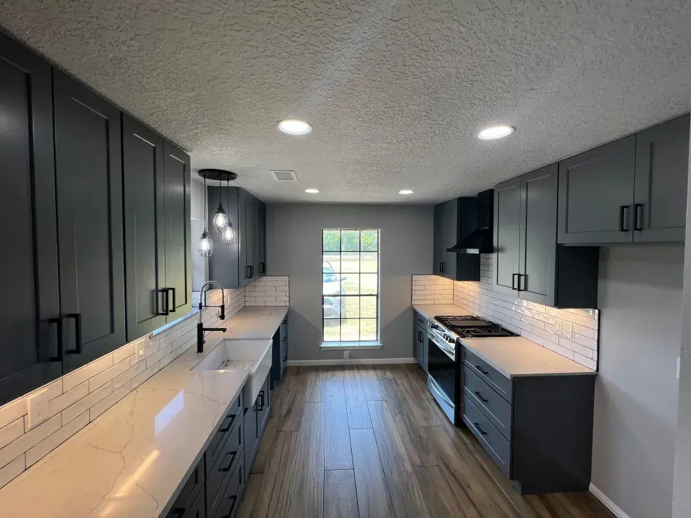 Galley kitchen remodel in Alvin, TX with smart storage and upgraded lighting that makes the space feel open