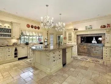 Full Premier-tier transformation with custom cabinetry, statement island, and finish detail everywhere you look